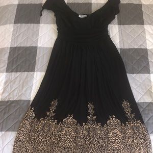 Little black dress with tan patteen on bottom